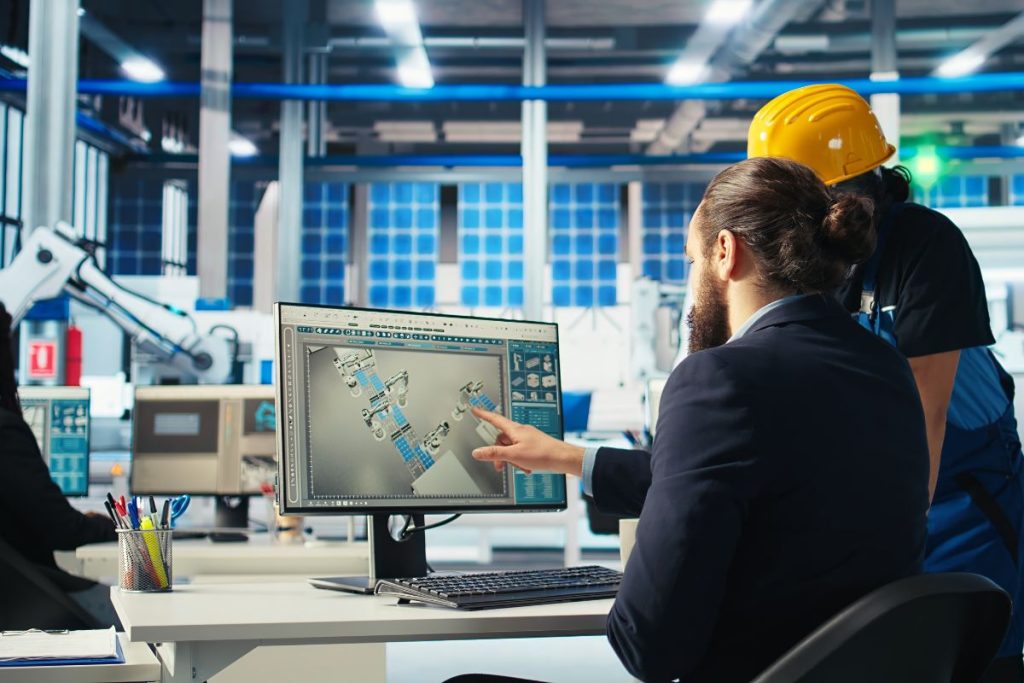 Industrial asset management solution in India showcasing a smartphone scanning a terminal to demonstrate cost-effective, real-time asset tracking and labor optimization