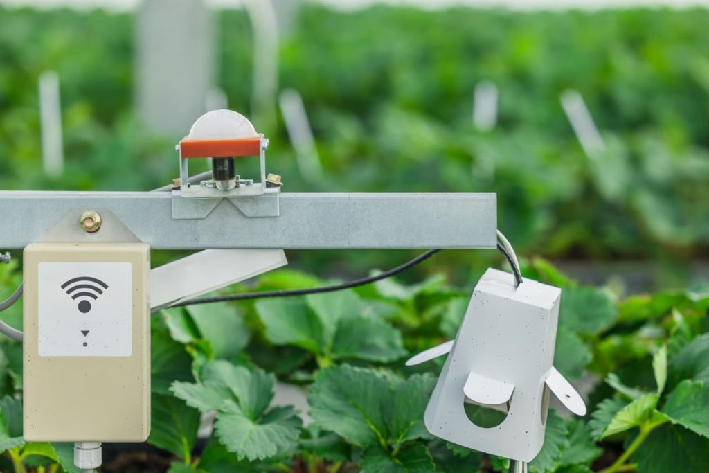 IoT sensor monitoring showing temperature, vibration, and performance data for predictive maintenance